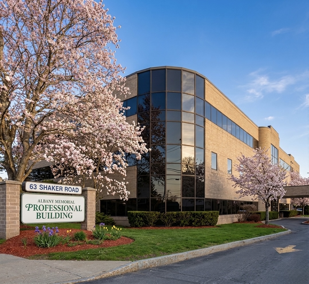 Albany Eye Associates at 63 Shaker Road — Albany Memorial Professional Building exterior with spring blossoms